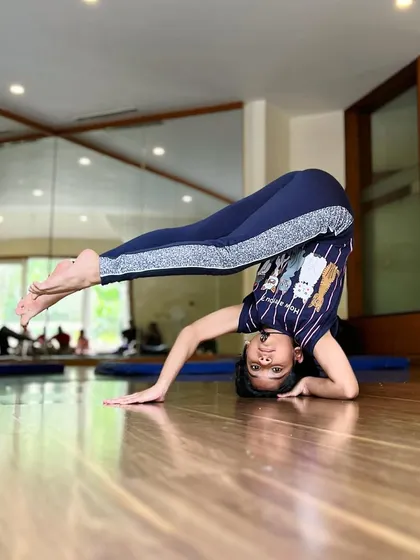 A different perspective on the headstand. We encourage students to play with shapes and find what feels good in their bodies.
