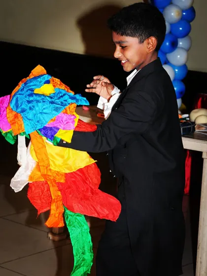 Even as a young magician, I loved the vibrant colors of the silk fountain trick. It's a timeless piece of magic that never fails to get a gasp from the audience.