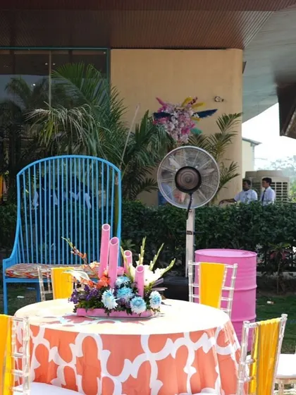 Guest seating at a carnival-themed event, with colorful table linens and quirky decor elements that create a fun and relaxed atmosphere.