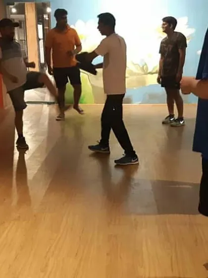 Group training builds a strong unit. Here, students practice kicking drills together, learning from each other and pushing one another to improve.