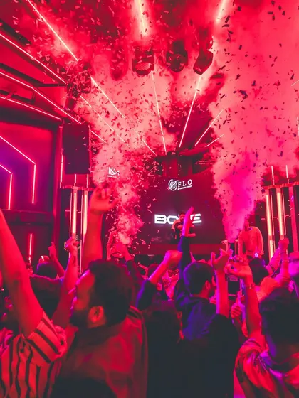 The party is in full swing with confetti cannons blasting. I use production elements like these to elevate the energy and create a concert-like feel for any event.