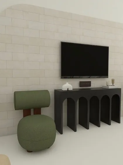 The TV area in this modern living room is kept minimal with an arched console table and a simple brick-textured wall, allowing the unique furniture to stand out.