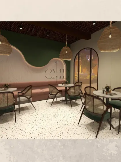This seating area combines a comfortable pink upholstered banquette with classic cane chairs. The curved, backlit wall feature adds a soft, sculptural element to the room, enhancing the cozy and chic ambiance.
