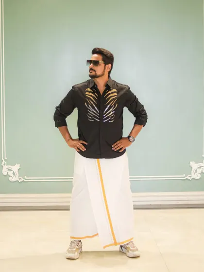 A confident pose in my South Indian attire. Being able to host for Tulu, Marwari, Gujarati, and other communities is a specialty of mine.