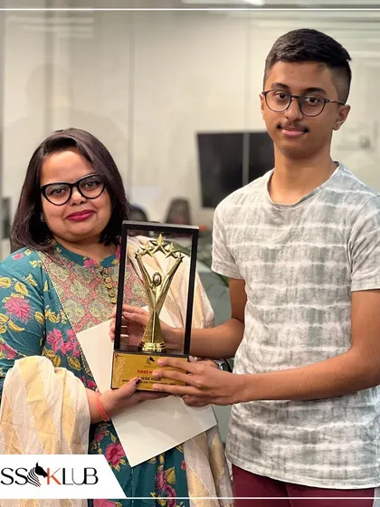 One of our tournament champions receives his well deserved trophy. We are committed to fostering a spirit of healthy competition and rewarding excellence.