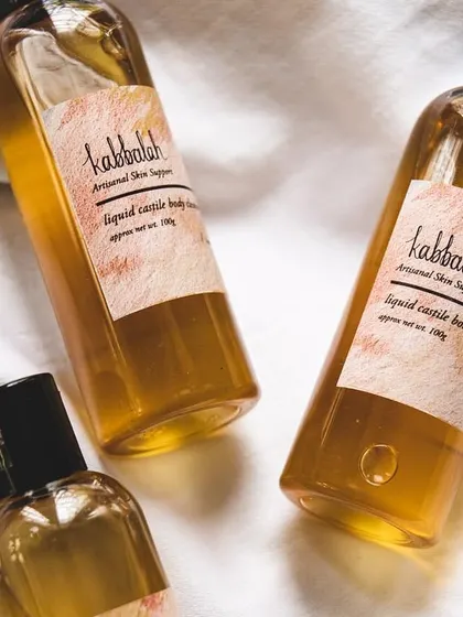 Three bottles of my castile cleanser, ready to be shipped. It's a refreshing and mood-uplifting addition to your daily shower.