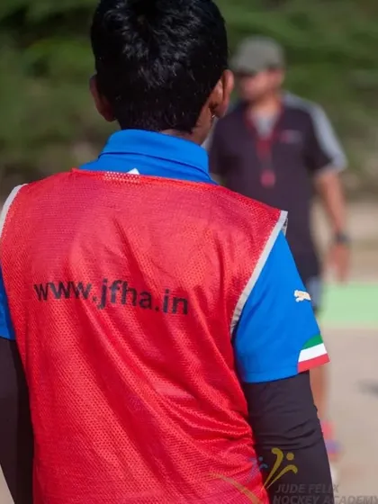 A player wearing our academy bib, a symbol of being part of the JFHA team, during the 2022 camp.