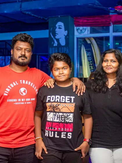 A family with their son posing for a picture. It's great to see families choosing my pub for their celebrations.