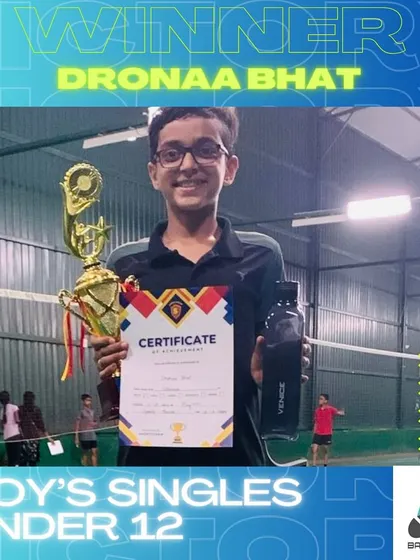 A big win for Dronaa Bhat, securing the trophy in the Boy's Singles Under 12 category. His focus and determination on the court were outstanding.