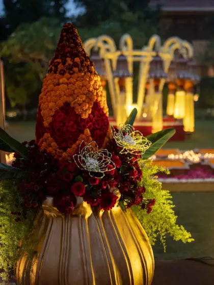 Another view of the symbolic 'Kalash' arrangement, showcasing its intricate floral work and the beautiful contrast of colors.