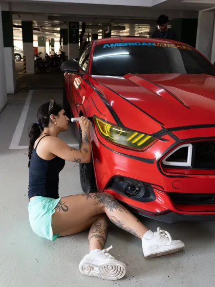 Getting the details right on the headlights of the cartoon-style Mustang.