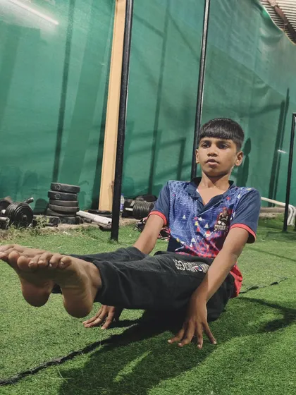 This young boy is building a powerful core with his L-sit practice. The foundation for all advanced skills starts here.