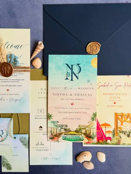 For Nistha and Prajval's destination wedding in Goa, we designed a complete stationery suite that captured the essence of a beach celebration. The set includes watercolor illustrated cards, a welcome note with a custom wax seal and seashell details, and matching gift tags.