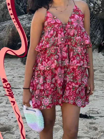 Highlighting the details of my frilly dress with some abstract pink and red lines that complement the pattern.