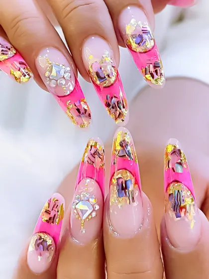 An example of inbuilt polygel nail art. This design features a vibrant pink French tip with encapsulated shell pieces and gold foil for a rich, textured look.