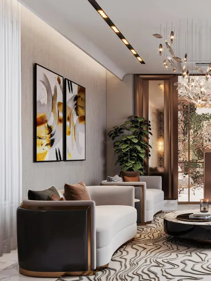 This angle highlights the room's thoughtful layout, showing how curved seating and curated art create a sophisticated yet comfortable conversation area. The play of light and shadow adds depth to the scene.