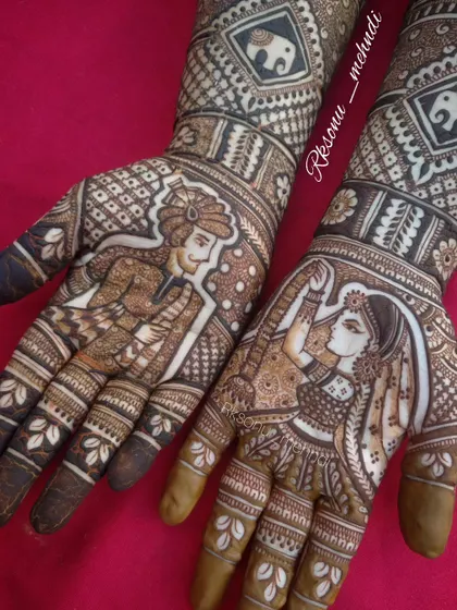 This bridal design brings a classic wedding scene to life, with a groom portrait on one hand and a dancing bride on the other. The surrounding patterns include elephants and intricate check-work for a festive look.