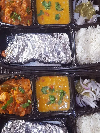Two thalis with dal and kadai paneer, one of my most requested combinations. It's a crowd-pleaser that never disappoints.