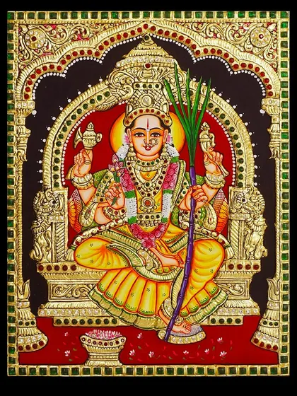 This unframed Tanjore painting of Goddess Lalitha Devi showcases her divine grace and beauty. The intricate gold work and vibrant colors make it a powerful symbol of prosperity and devotion.