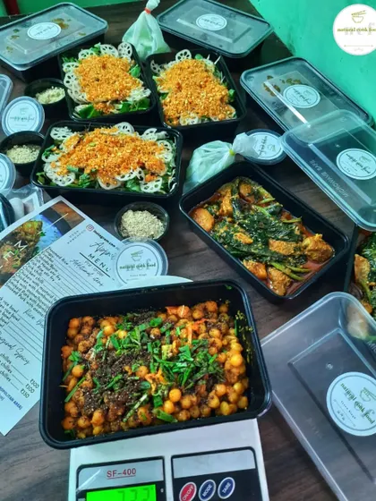 Weighing and packing 'Kelichana' and 'Singju' for an order. I ensure every customer gets a generous portion.