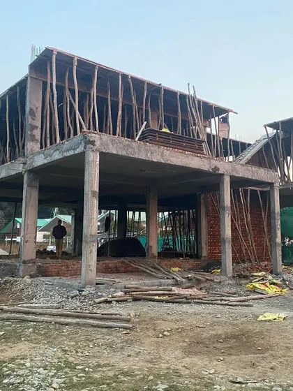 Another view of the Dehradun villa's structure, showing the progress of the multi-level framework.