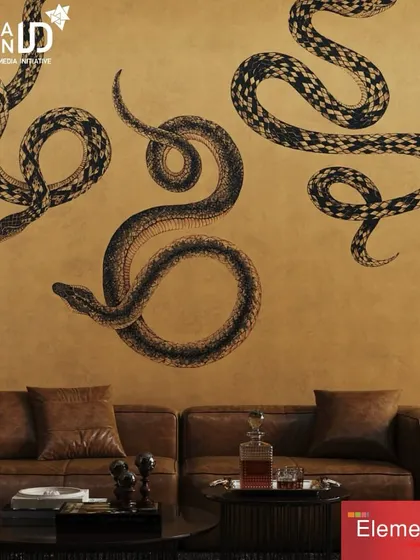 A bold and dramatic snake-print wallpaper from our collection, showcased in a promotional image for India Design. This design is for those who dare to make a statement, blending luxury with an edgy, untamed spirit.