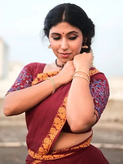 A portrait from a shoot where I explored the idea of 'aharya' (adornment) with minimal makeup and jewelry. It made me question how much of our identity as dancers is tied to our costume.
