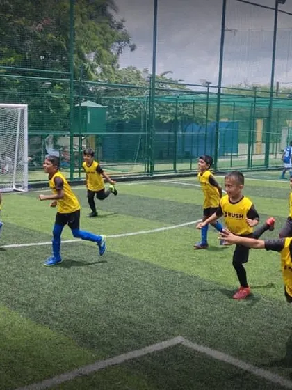 Our young players warming up before their match in the Karnataka Youth League. Proper preparation is key to performance and injury prevention.