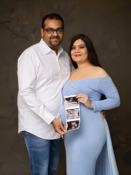 Sharing the first picture of their baby. This couple portrait with the ultrasound scan is a powerful and emotional keepsake.