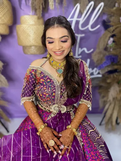 Dewy glam for this diva in a vibrant purple lehenga. I created a luminous, flawless base and a soft purple-toned eye to match her stunning outfit.