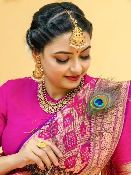 A creative shot with a peacock feather, adding a touch of traditional artistry.