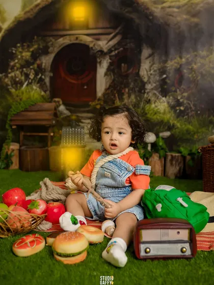 A magical picnic in a hobbit's glen. This enchanting set creates a storybook feel for a child's portrait session.