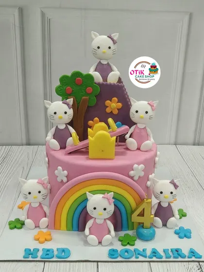 A closer look at our detailed Hello Kitty cake. Each fondant figure is carefully crafted to bring the beloved character and her world to life for a special birthday celebration.