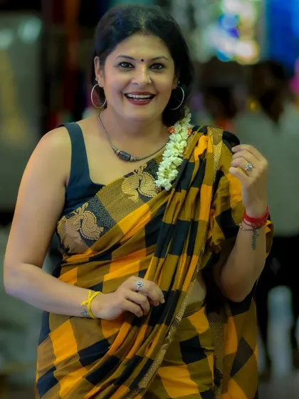 A joyful, smiling shot that captures the carefree spirit I bring to my styling. Fashion should be fun and make you feel happy.