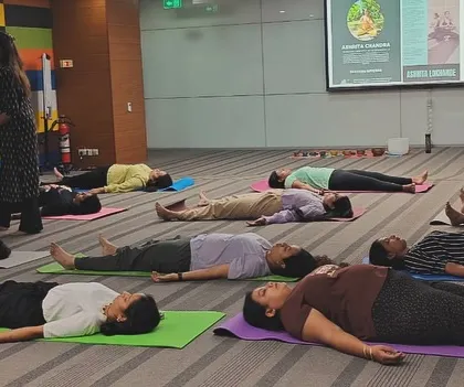 The final moments of a guided relaxation at a corporate event. The goal is to leave everyone feeling refreshed, centered, and ready to continue their day with renewed focus.