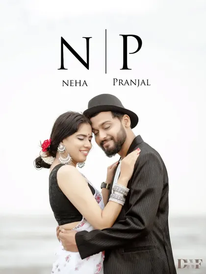 A classic portrait with a modern monogram. The couple's loving embrace and the groom's stylish hat give this beach photo a unique and personalized feel.