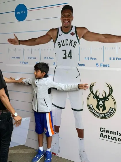 How do you measure up? One of our young players has some fun comparing his wingspan to that of NBA superstar Giannis Antetokounmpo at a Jr. NBA event. These experiences are both motivational and memorable.