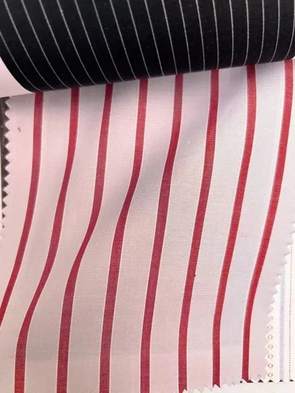 Bold red and white stripes for a statement shirt. We encourage our clients to express their personality through their fabric choices.
