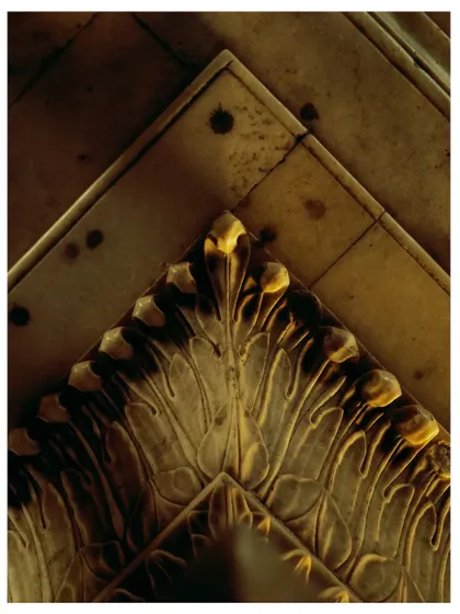An abstract detail of the marble inlay work on the tomb's ceiling, showing the beauty in the patterns and decay.