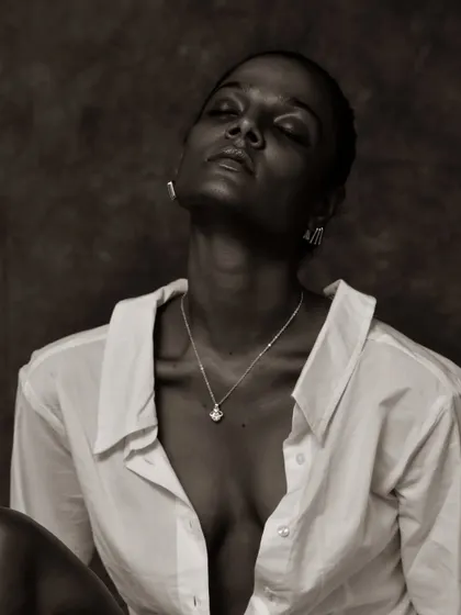An eyes-closed, serene moment captured in beautiful monochrome tones.