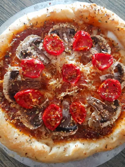 A crowd favourite, my stuffed-crust vegan pizza. This one features a gluten-free base, juicy mushrooms, and sweet cherry tomatoes, all topped with my creamy, homemade plant-based cheese. It proves that pizza can be both indulgent and healthy.
