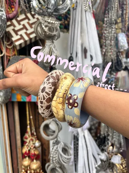 Trying on some beautiful bangles on Commercial Street, with a doodle to highlight them.
