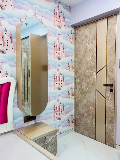 The same dressing unit with the mirror cabinet closed, showing its sleek, pill-shaped design against the castle wallpaper.