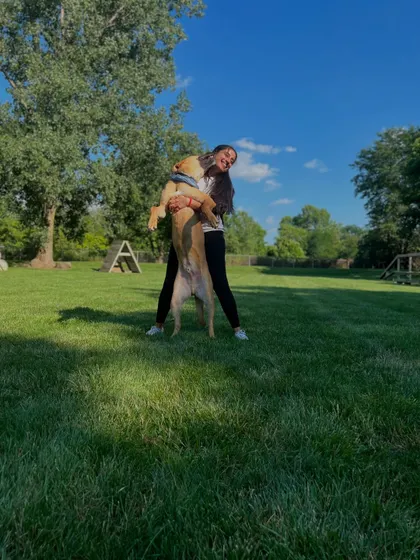 A moment of pure joy with my student dog, Doug, during my certification in the USA. He was my home away from home.
