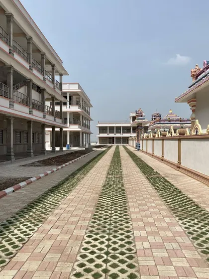 The use of grass pavers along this path allows for vehicle access when needed but maintains a green, permeable surface that fits the site's aesthetic.