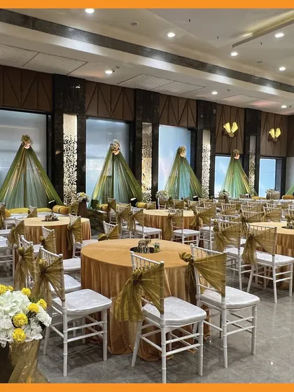 The full view of a Mehendi hall with individual seating areas for the bride and key family members. This ensures everyone has a special spot during the ceremony.