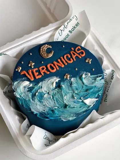 This mini cake is a work of art. I used buttercream to paint a beautiful night scene with crashing waves under a starry sky. It's perfect for the dreamer in your life.