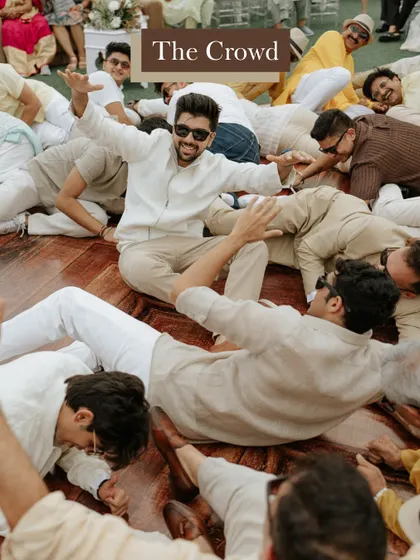 The groom's friends creating a fun, memorable pile-up during the Haldi festivities. It's these unscripted moments that become the best memories.