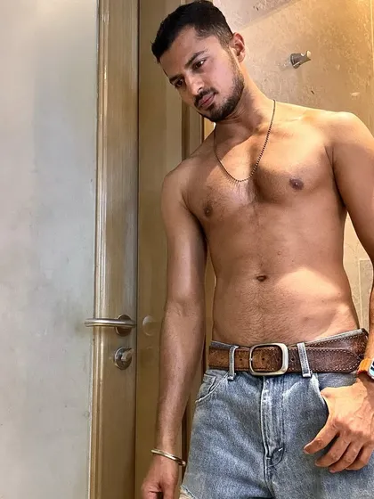 Another pose from the same series, showing different angles and highlighting the results of a consistent fitness regimen.