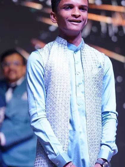 A young performer confidently taking the stage. We work to make every family member, regardless of age, feel comfortable and excited to be part of the celebration.